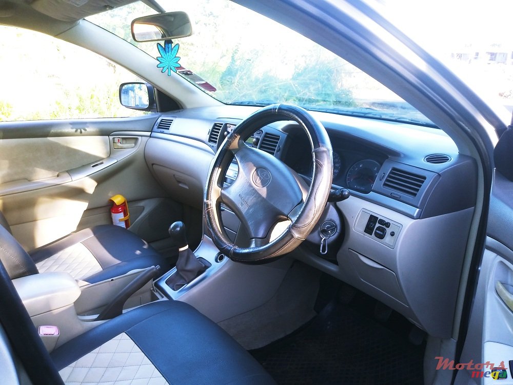 2004' Toyota Corolla Nze X photo #5