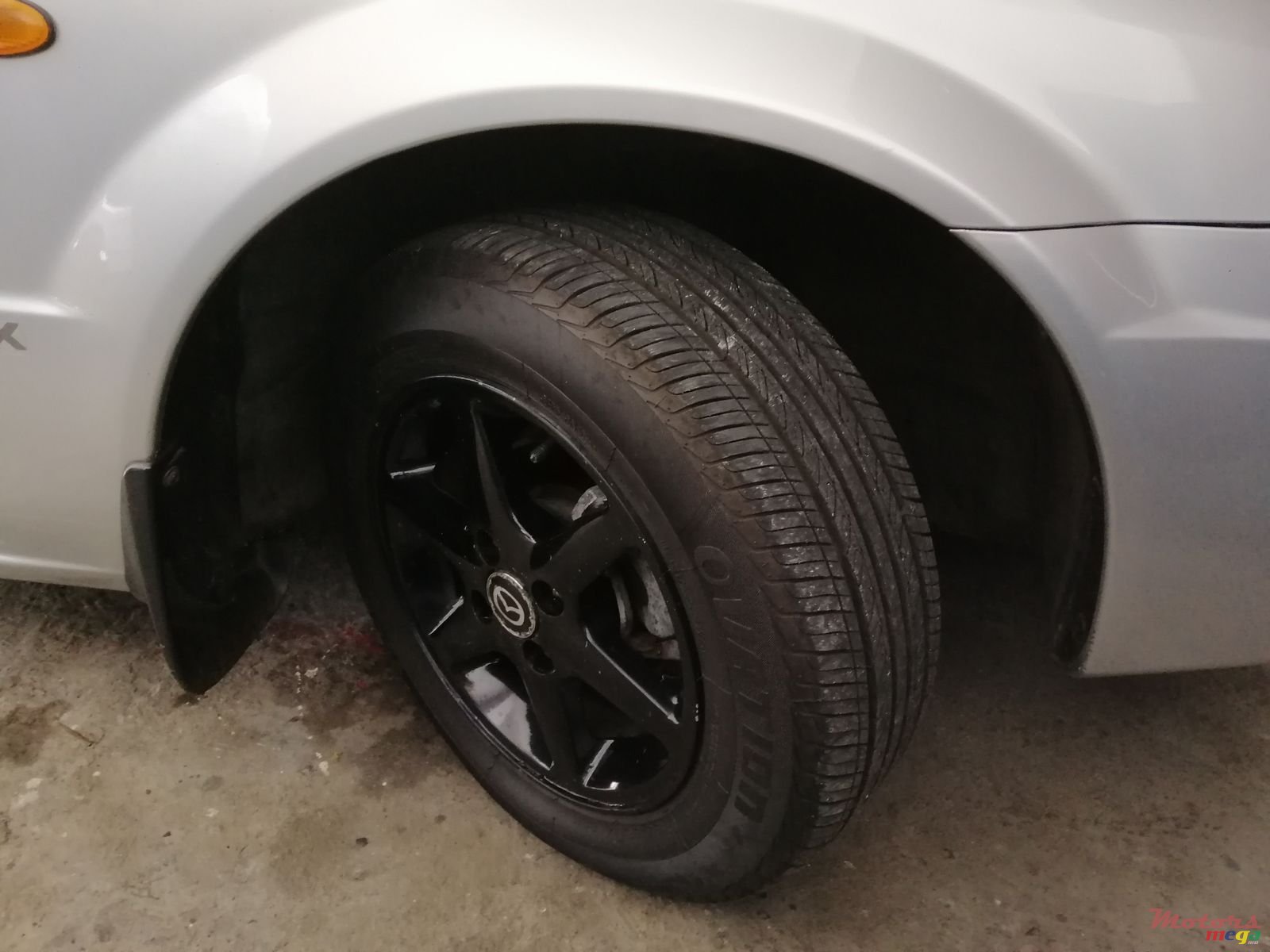 2002' Mazda 323 photo #4