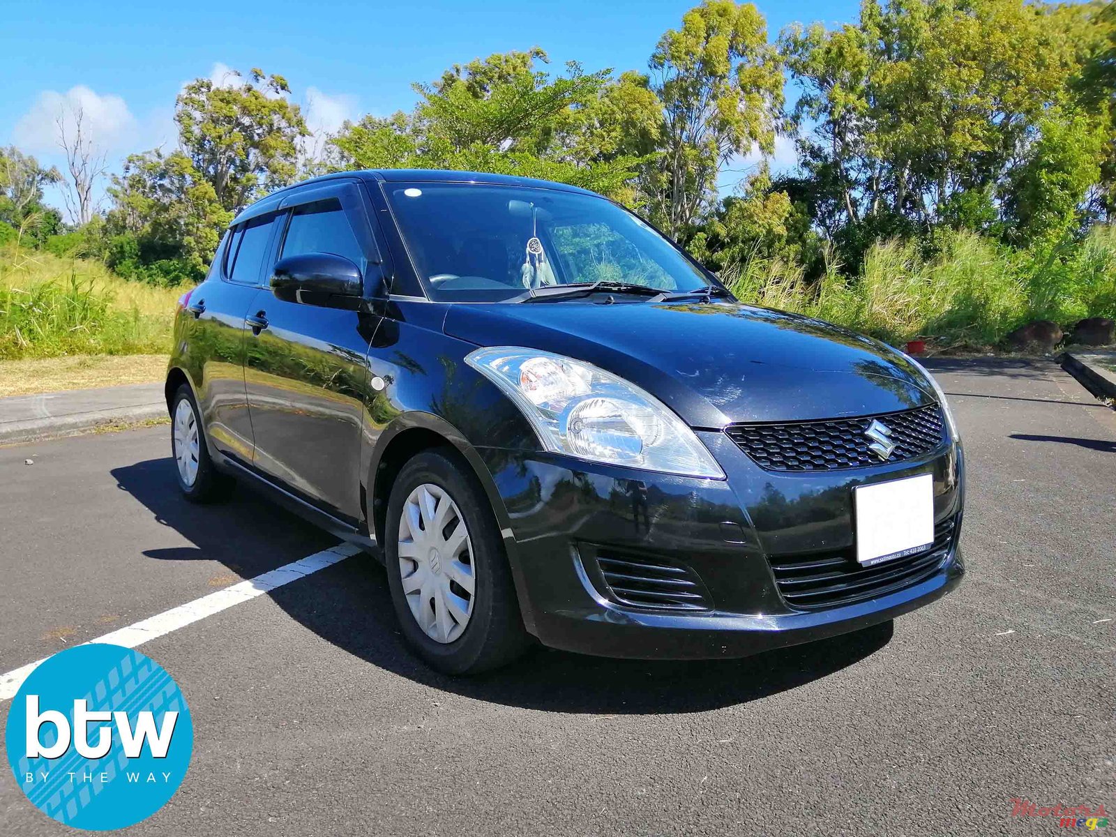 2012' Suzuki Swift photo #1