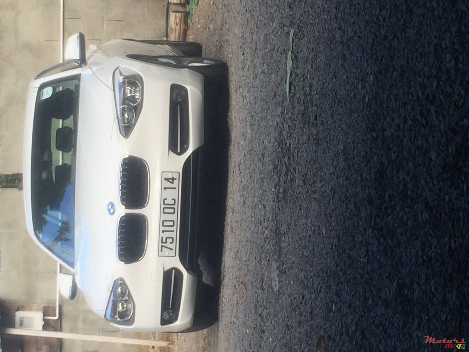 2014' BMW 116 Sport photo #1