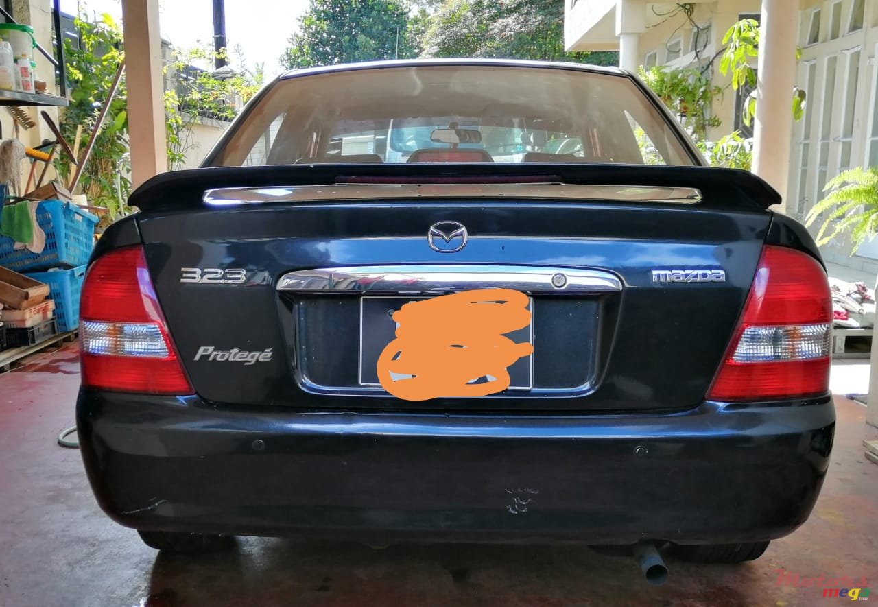 2003' Mazda 323 photo #7