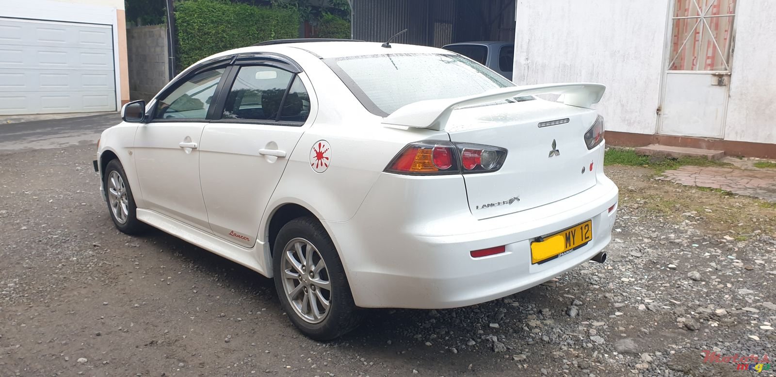 2012' Mitsubishi Lancer Ex photo #2