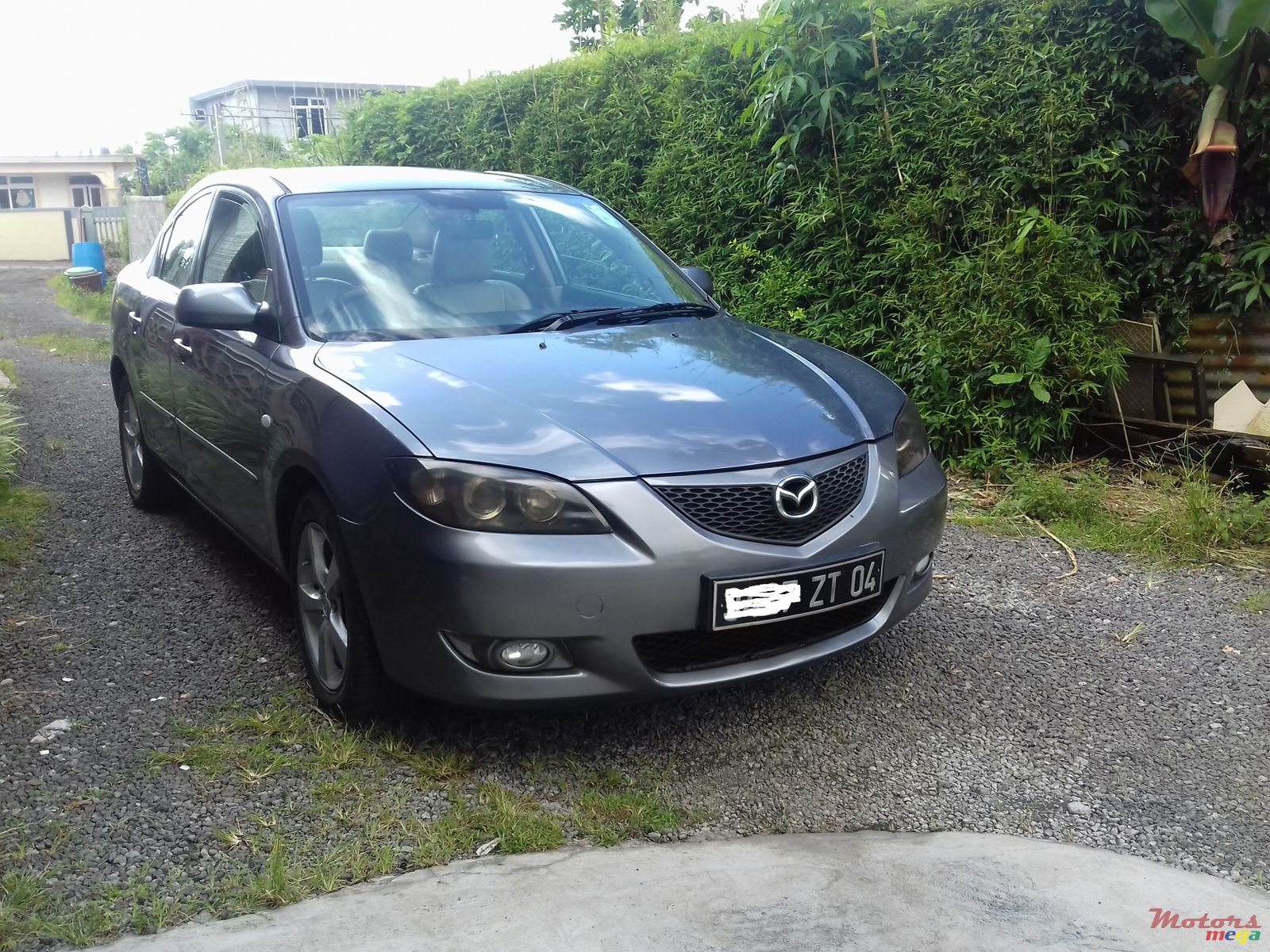 2004' Mazda 3 SEDAN photo #1