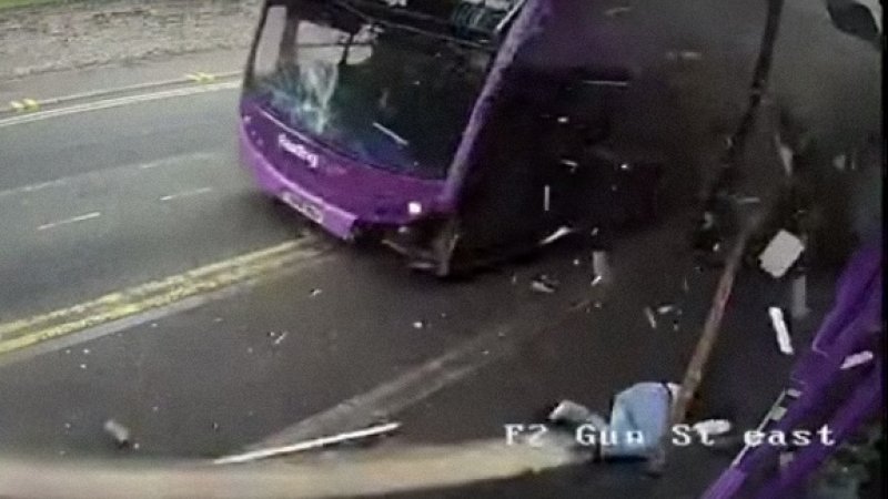 Watch Englishman get hit by a bus, stand up, walk into a pub