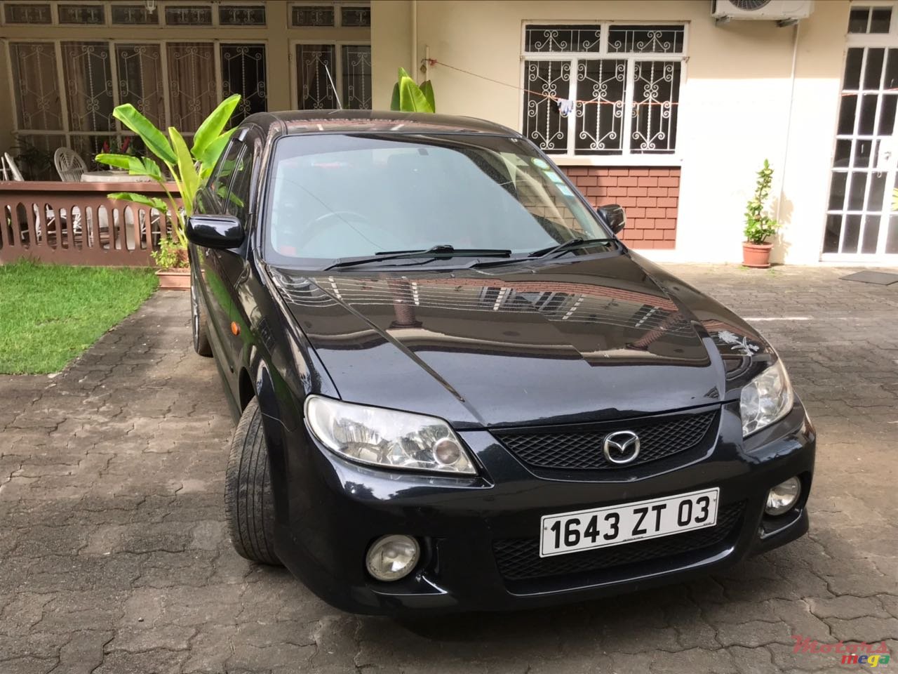 2003' Mazda Protege Origine sport 323 photo #4