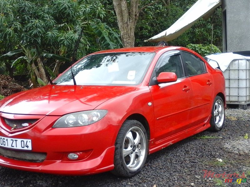 2004' Mazda 3 Ladydriven photo #1