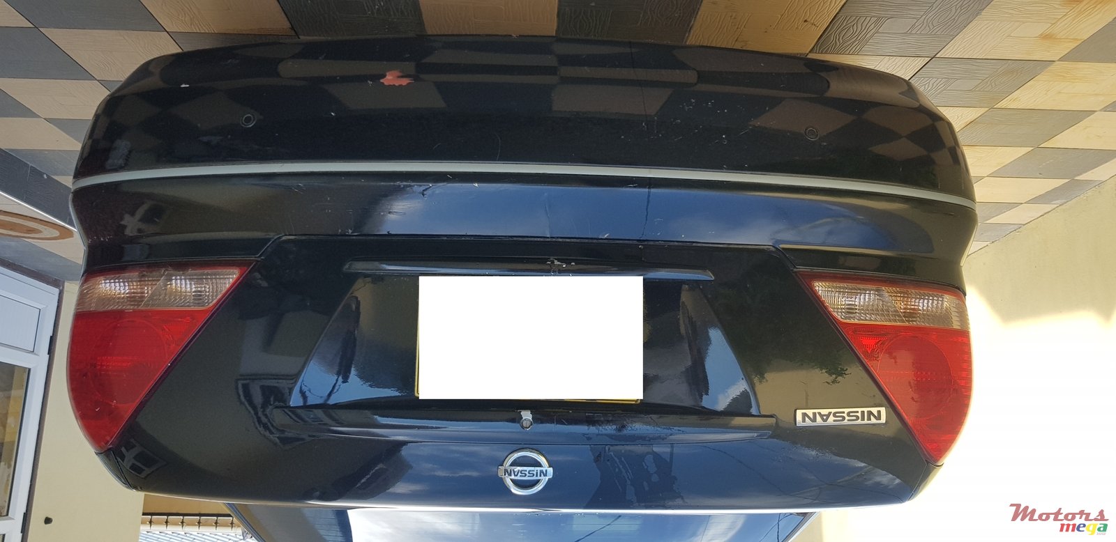 2004' Nissan Sunny photo #1