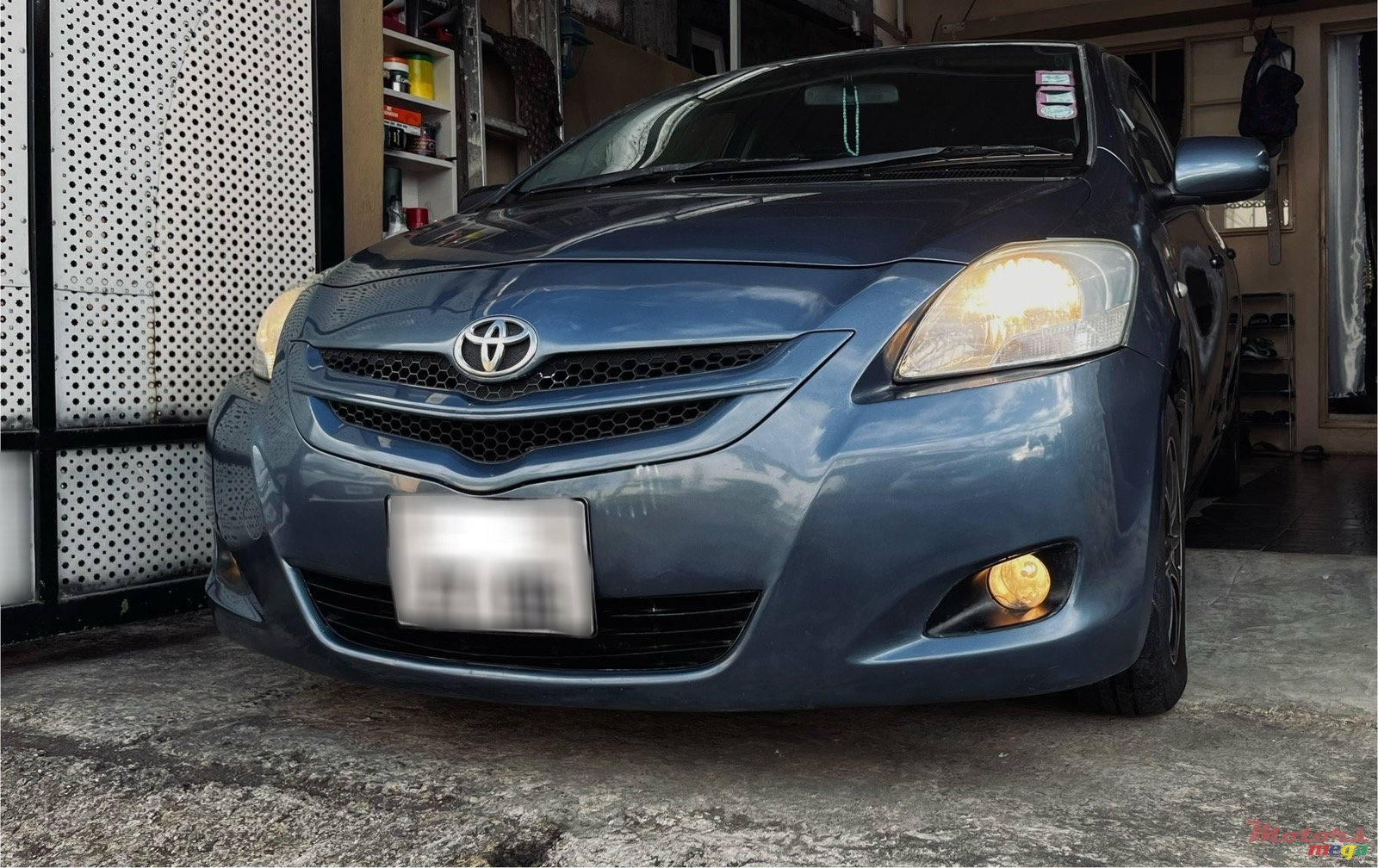 2006' Toyota Belta photo #1