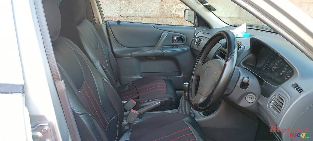2000' Mazda 323 photo #5