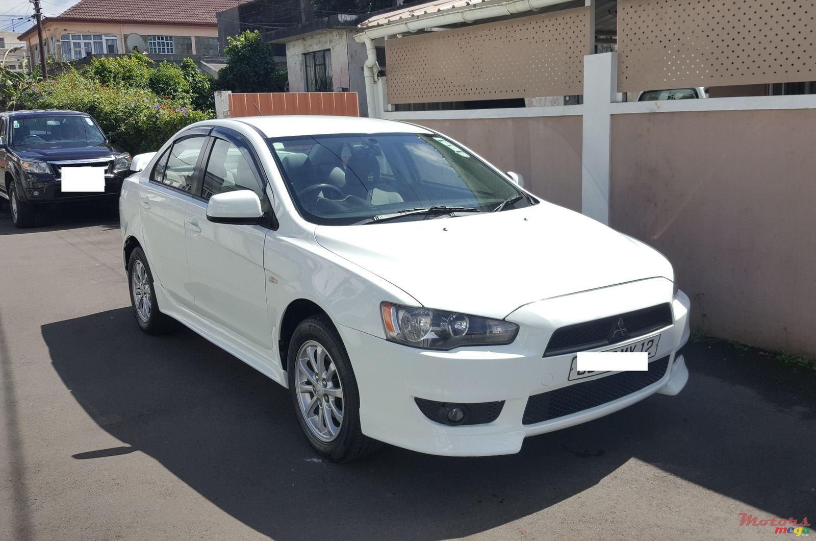 2012' Mitsubishi Lancer Ex photo #1