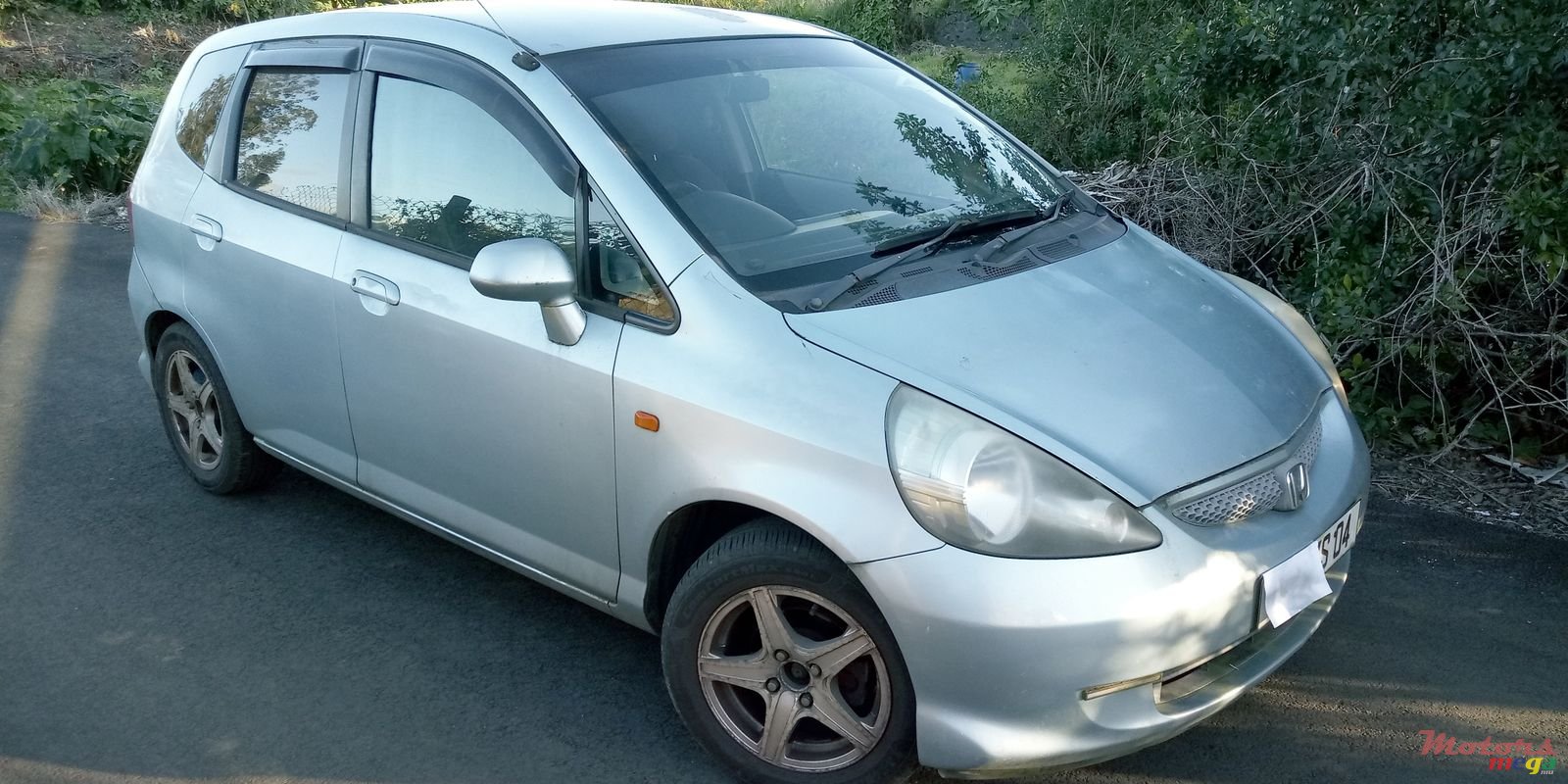 2004' Honda Fit photo #1