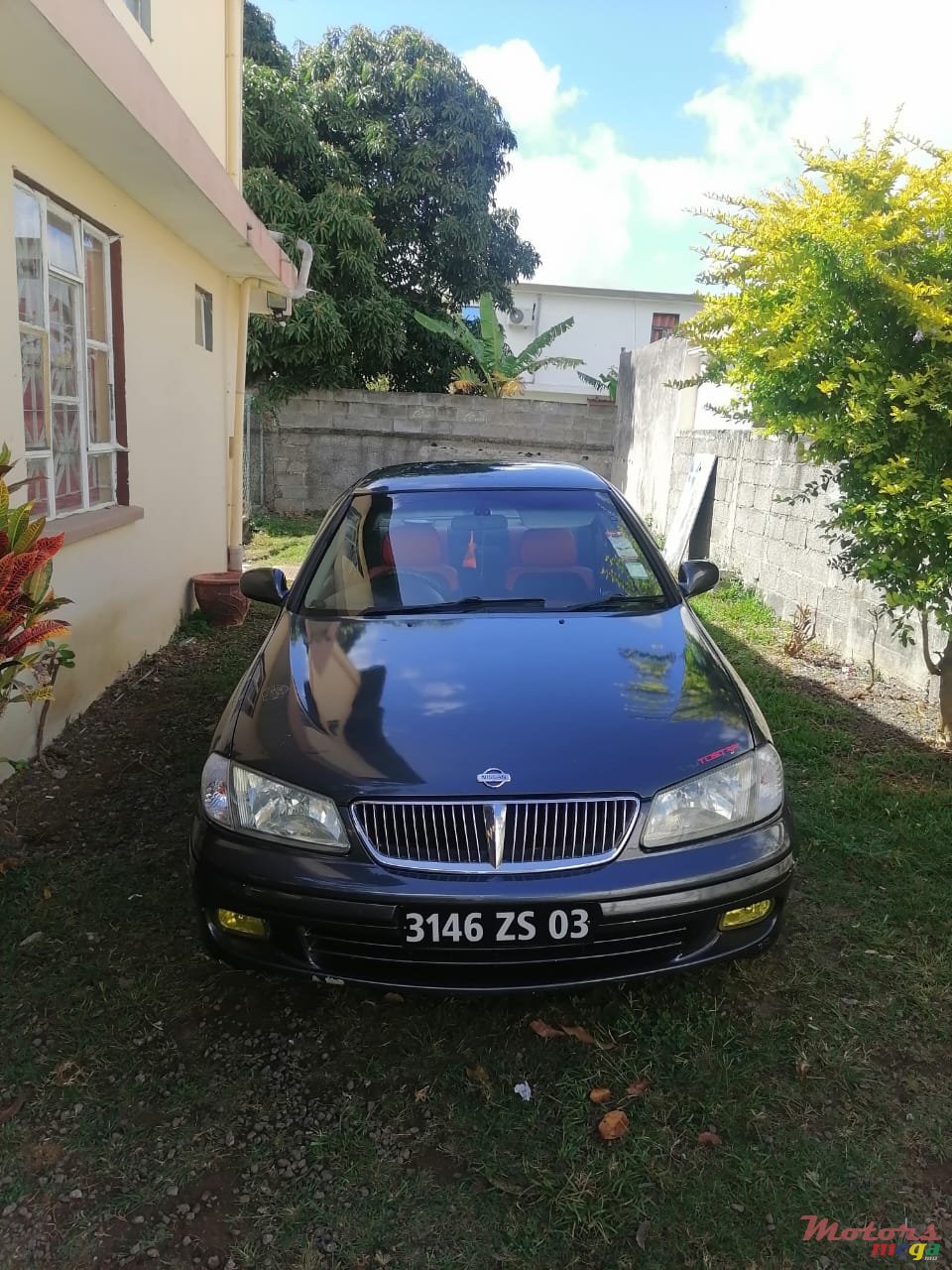 2003' Nissan Sunny photo #1