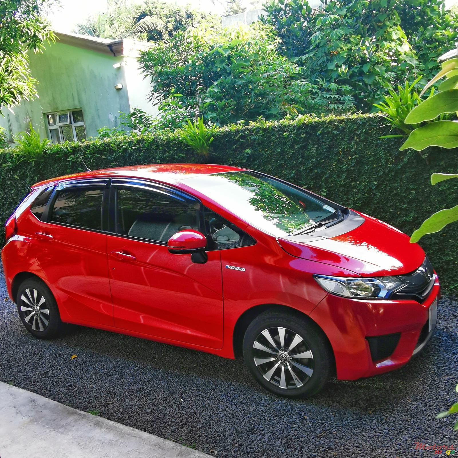 2014' Honda Fit Hybrid photo #1