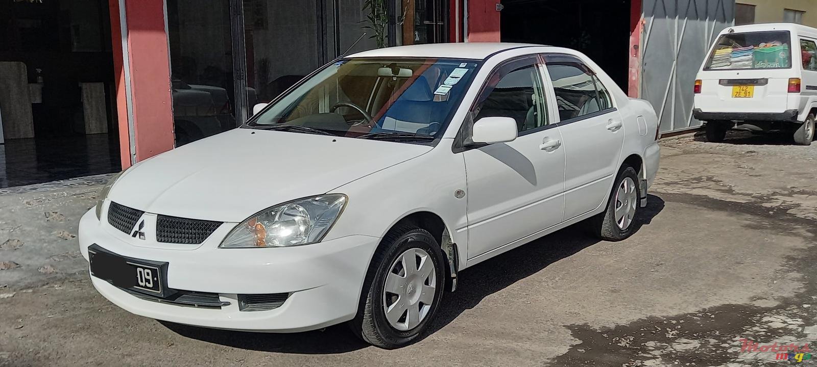 2009' Mitsubishi Lancer photo #2