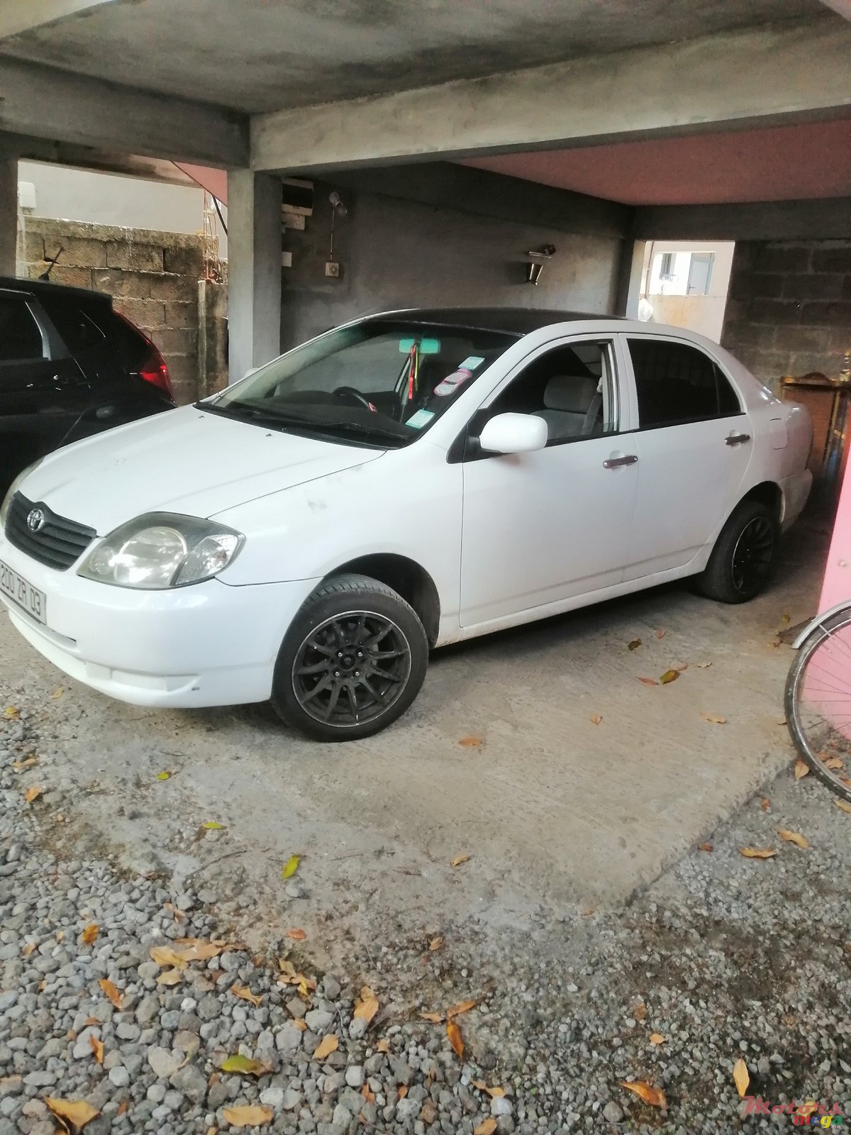 2003' Toyota Corolla NZE photo #7