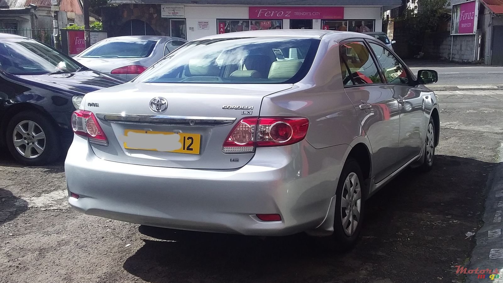 2012' Toyota Corolla LX photo #5