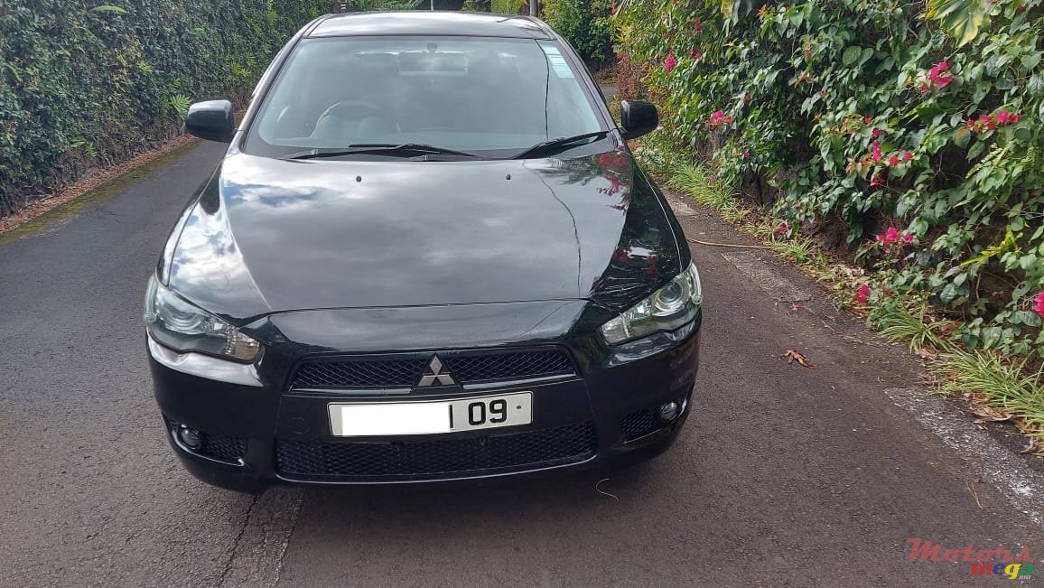 2009' Mitsubishi Lancer Ex photo #1