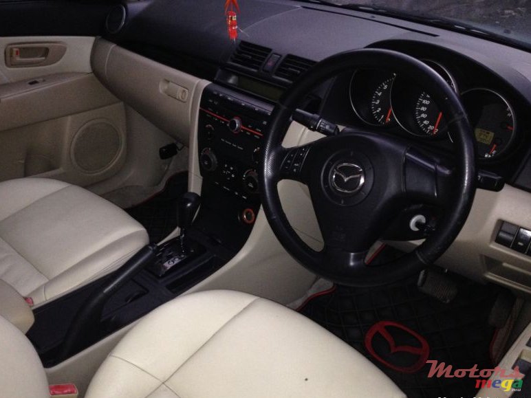 2004' Mazda 3 photo #3