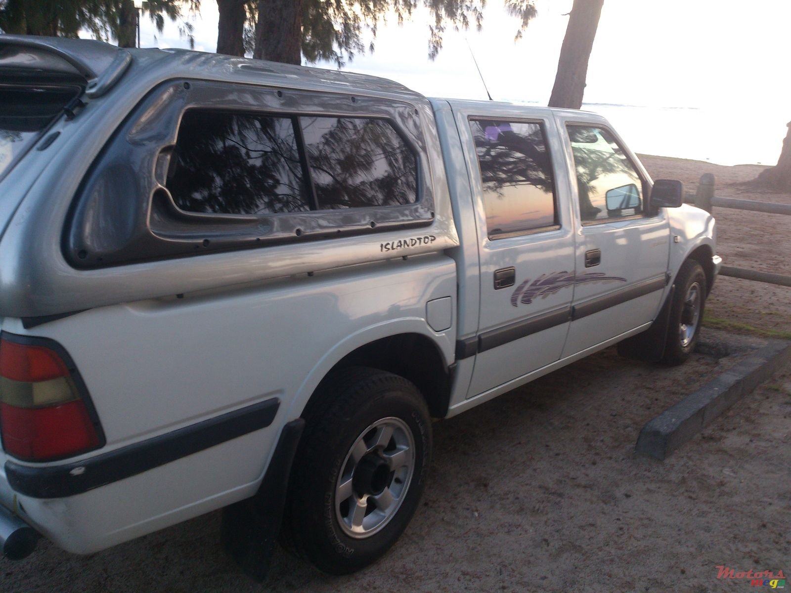 2003' Isuzu KB Series with canopy photo #1