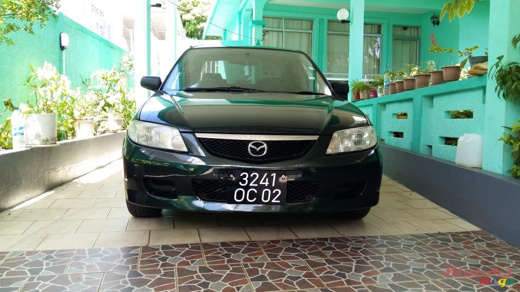 2002' Mazda 323 photo #1