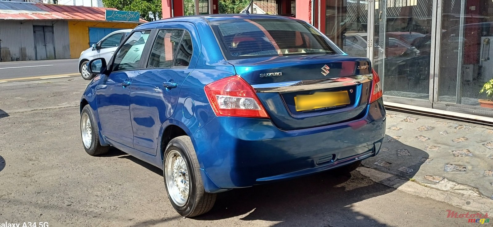 2013' Suzuki Swift Dsire photo #3