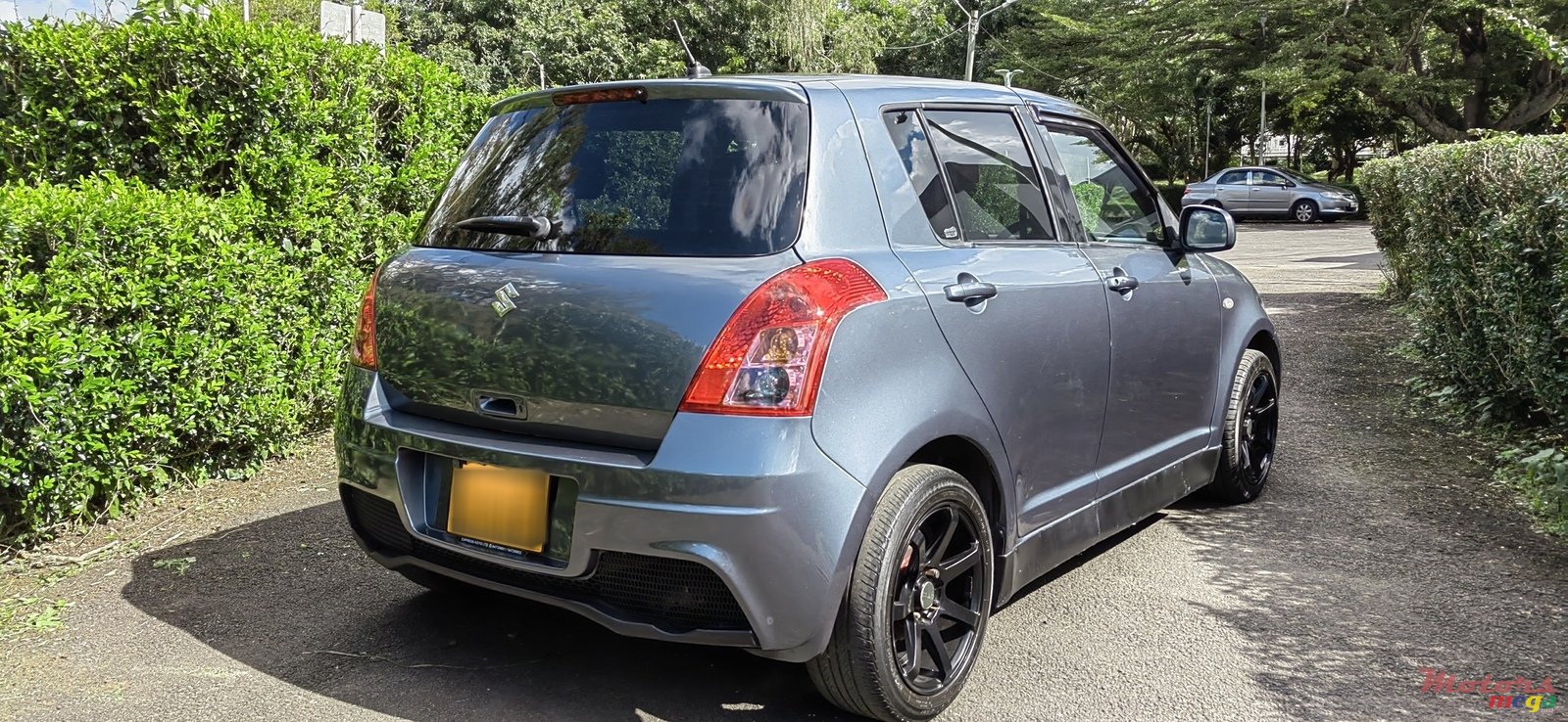 2009' Suzuki Swift photo #3
