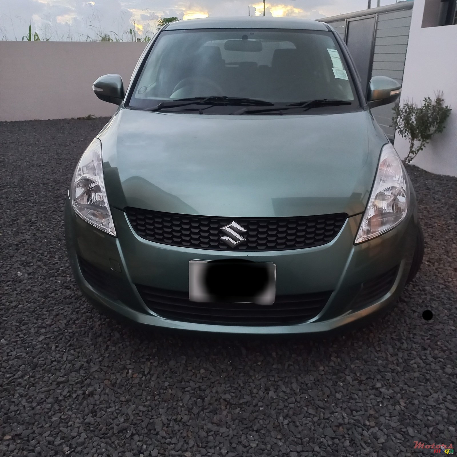 2013' Suzuki Swift photo #1