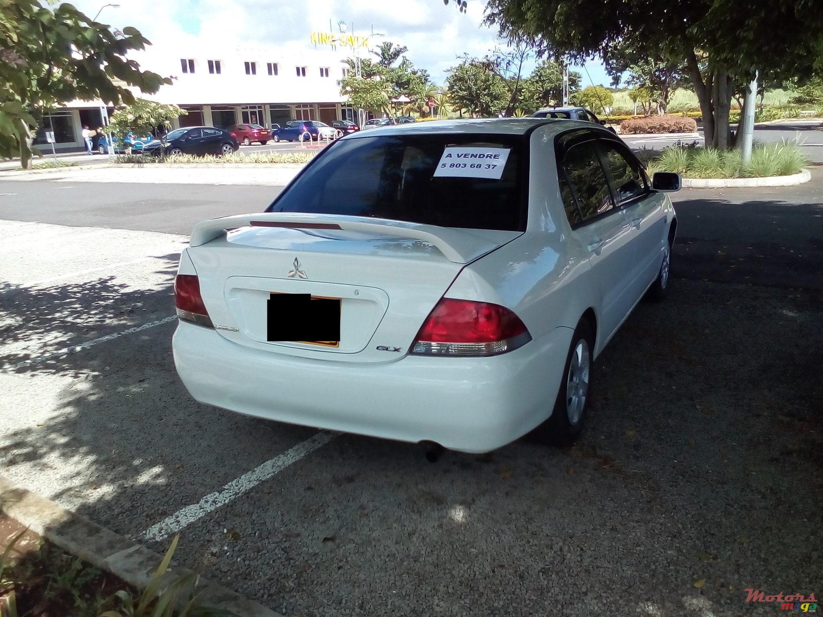 2004' Mitsubishi Lancer GLX photo #2