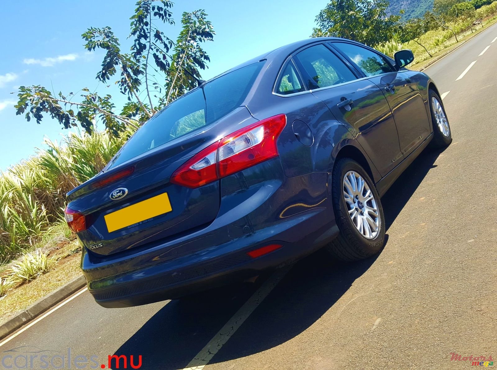 2014' Ford Focus 1.6 Sedan Titanium photo #4
