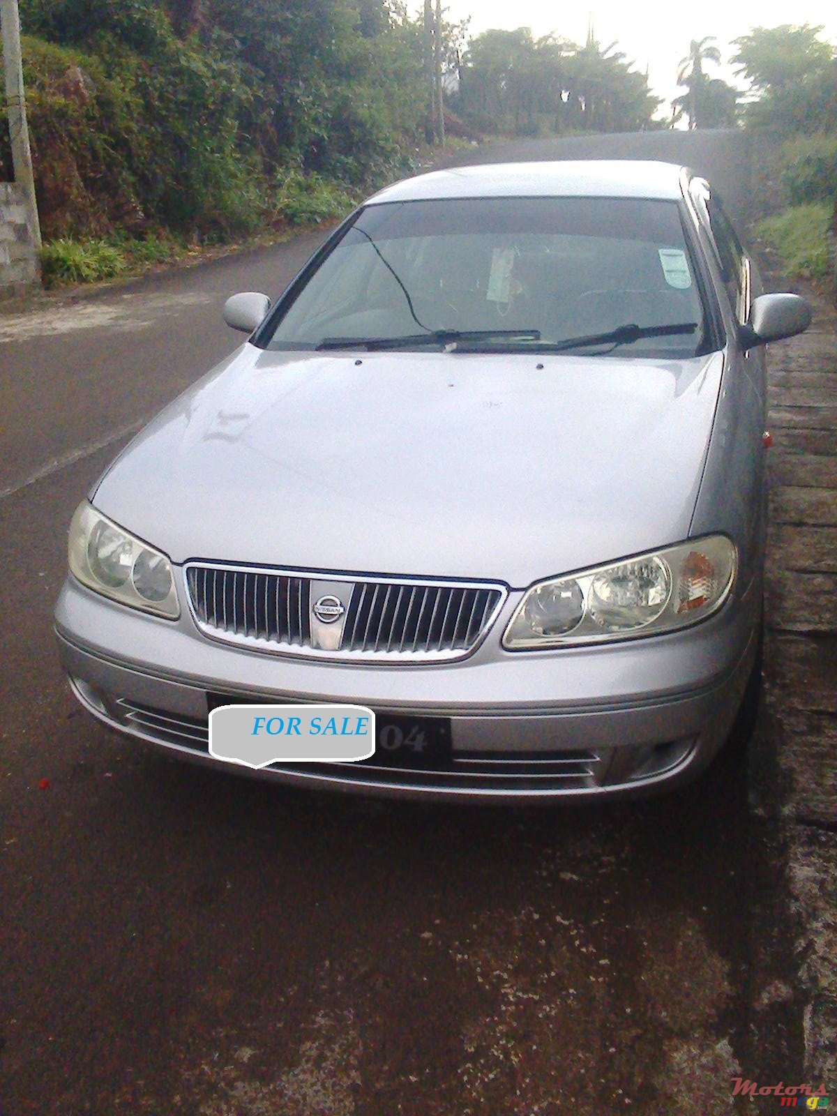 2004' Nissan Sunny photo #1