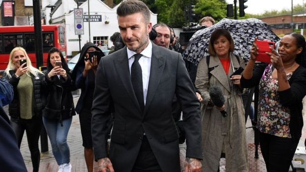 David Beckham banned from driving for using mobile phone