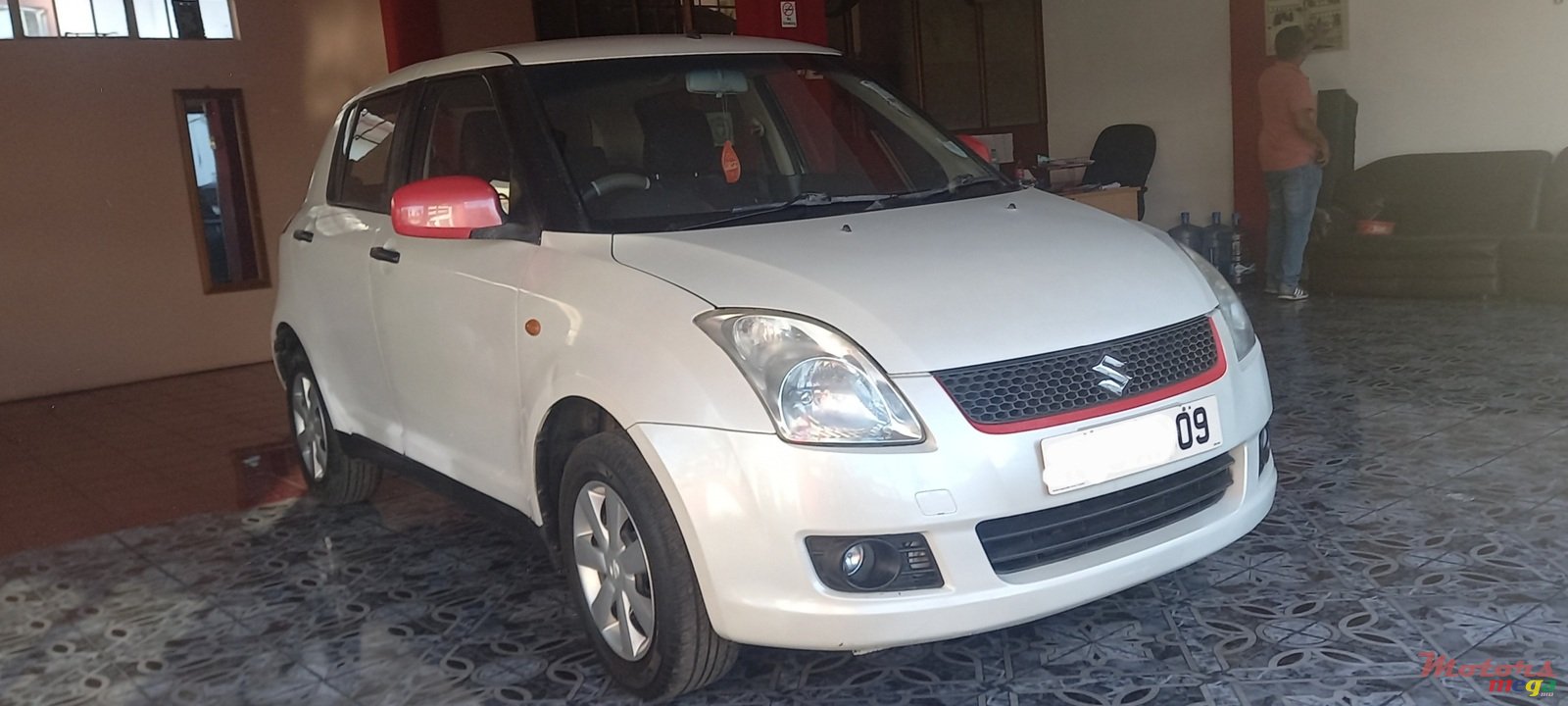 2009' Suzuki Swift VXi photo #1