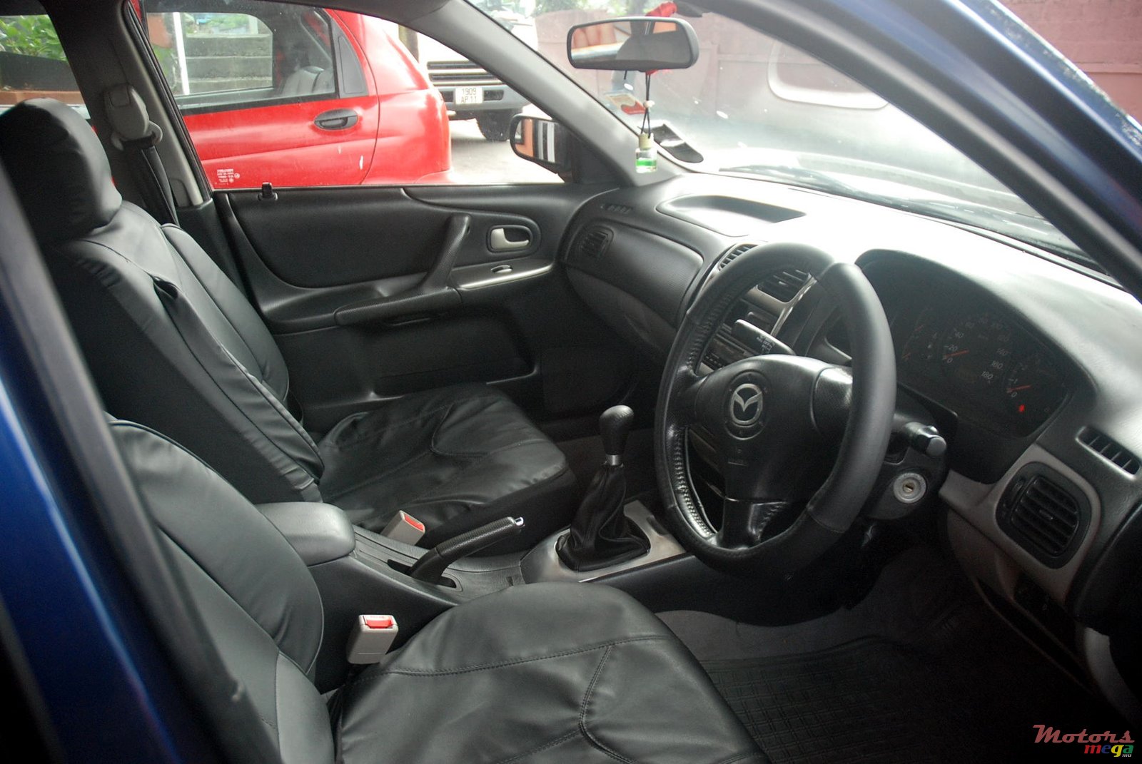 2003' Mazda 323 photo #3