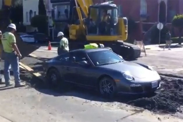 Watch This Hapless Porsche 911 Get Extracted from Wet Cement