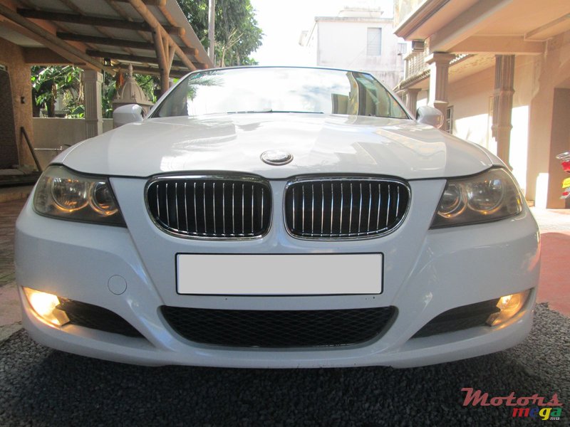2011' BMW 320 i photo #1
