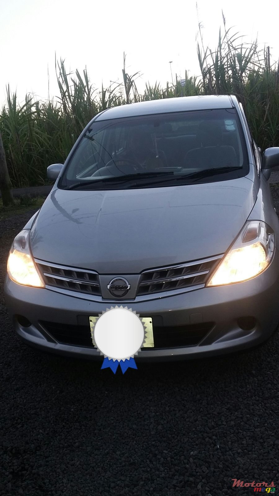 2010' Nissan Tiida photo #1