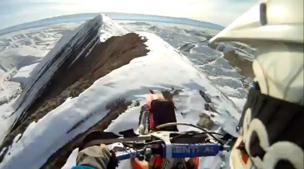 Watch as a Motorcycle Rides on Top of the World
