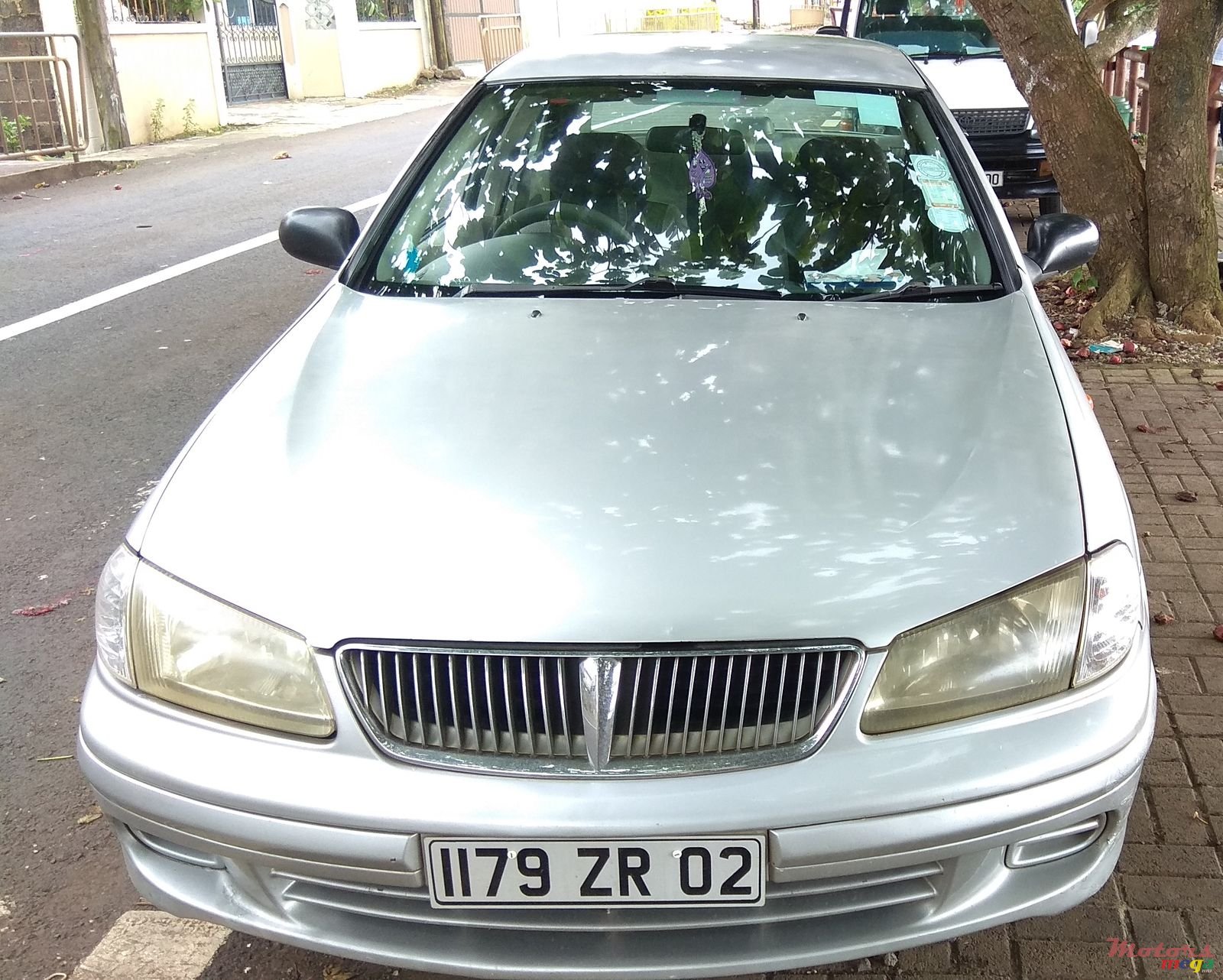 2002' Nissan Sunny photo #1