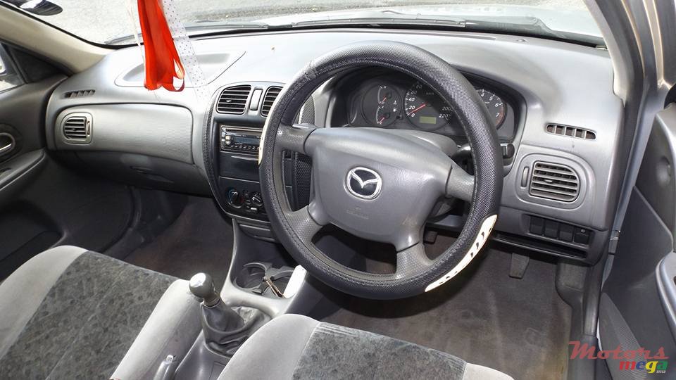 2000' Mazda 323 photo #5