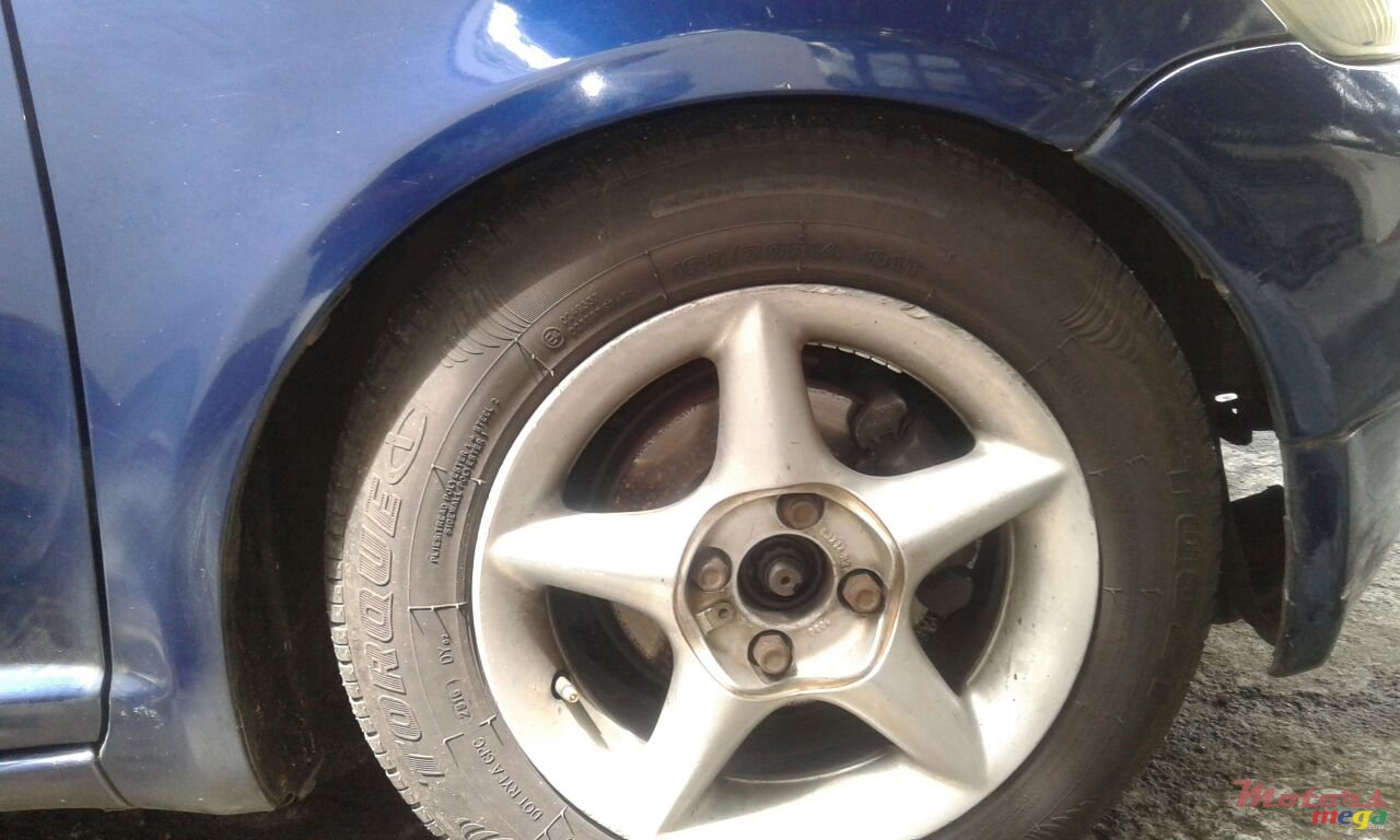 1999' Toyota Vitz photo #4