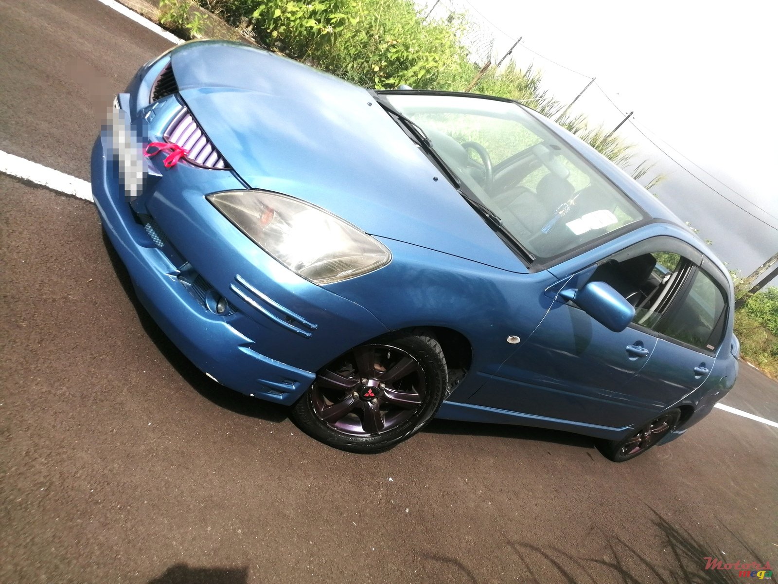 2004' Mitsubishi Lancer photo #3