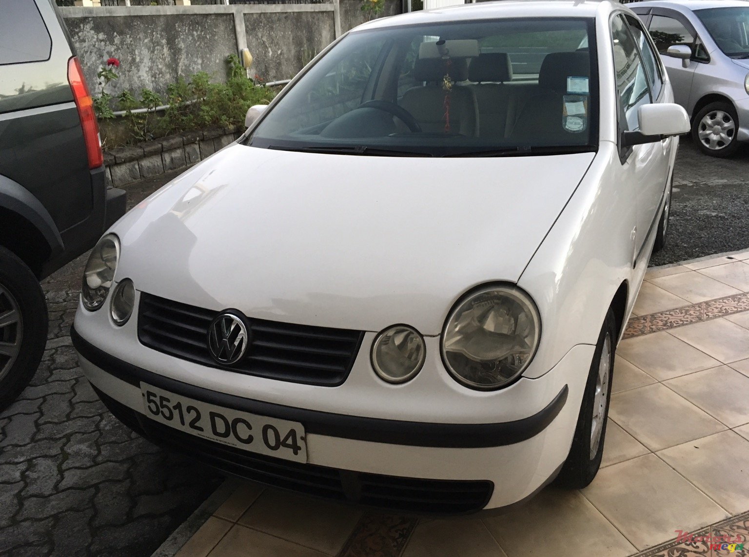 2004' Volkswagen Polo photo #2