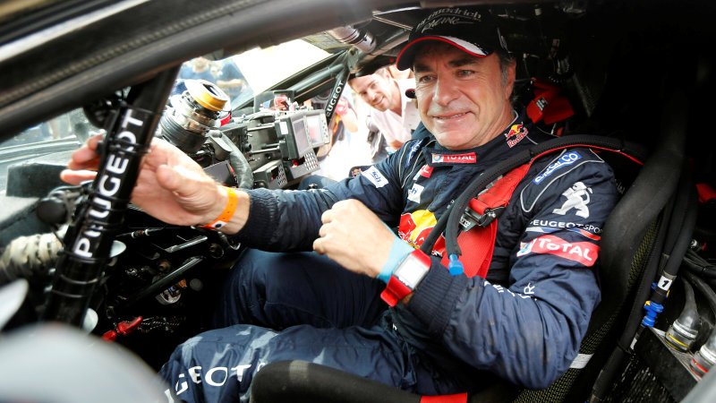 Carlos Sainz clinches Dakar victory for Peugeot
