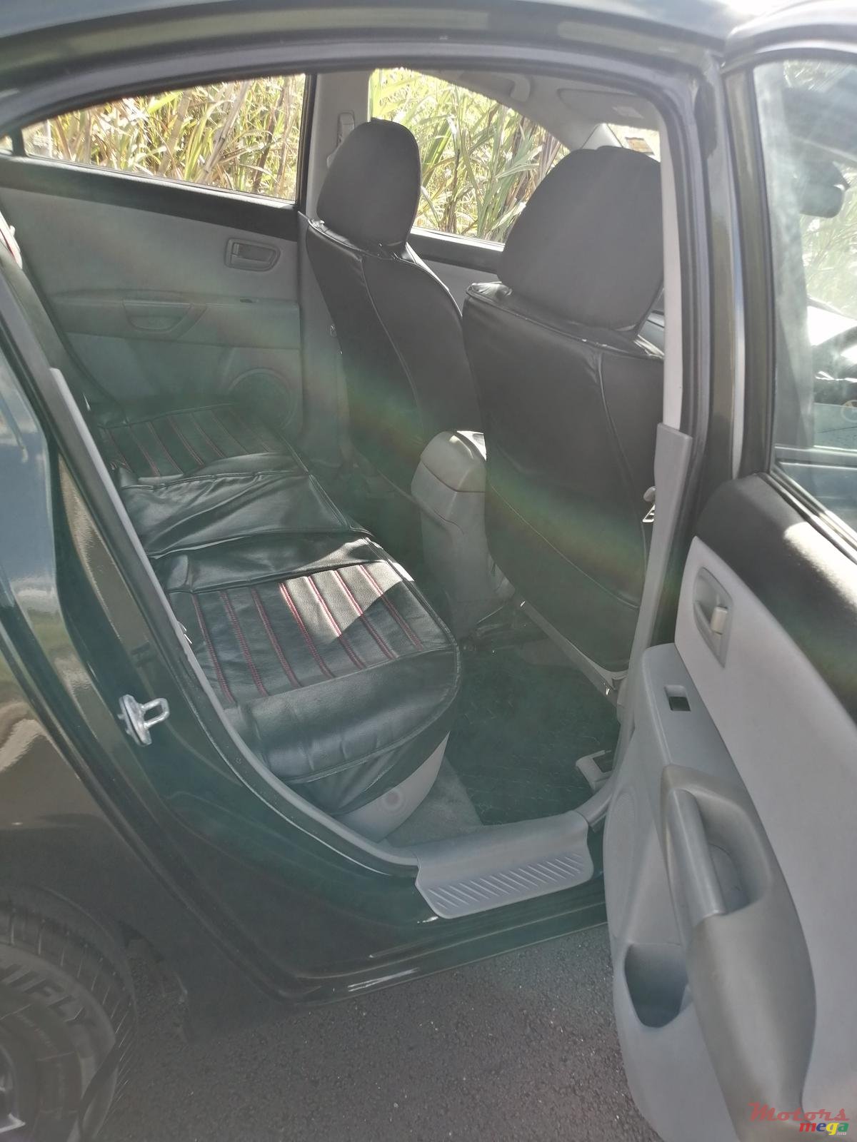 2004' Mazda 3 photo #2