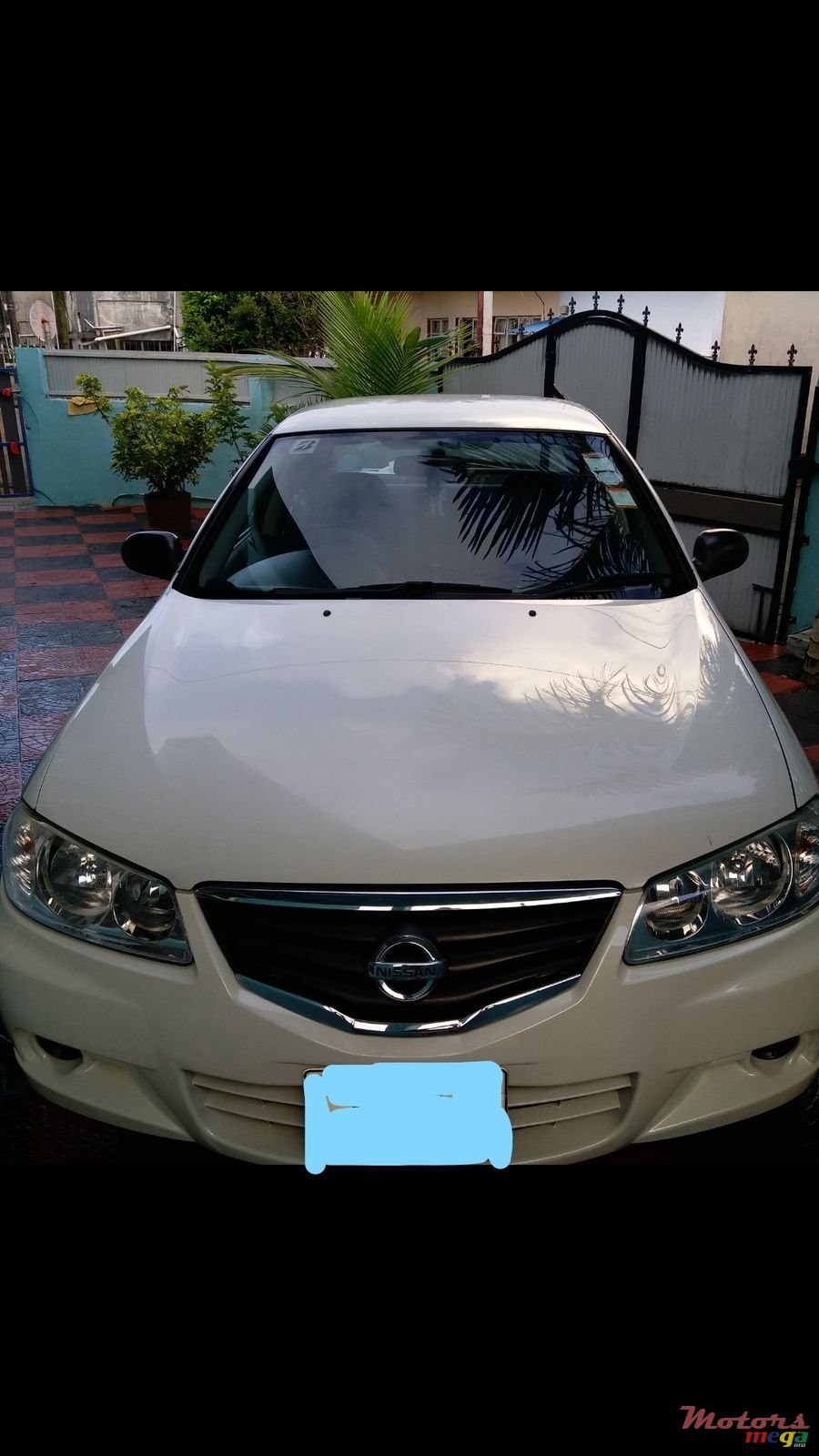 2010' Nissan Sunny photo #1