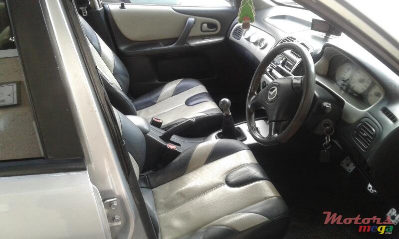 2003' Mazda 323 photo #5