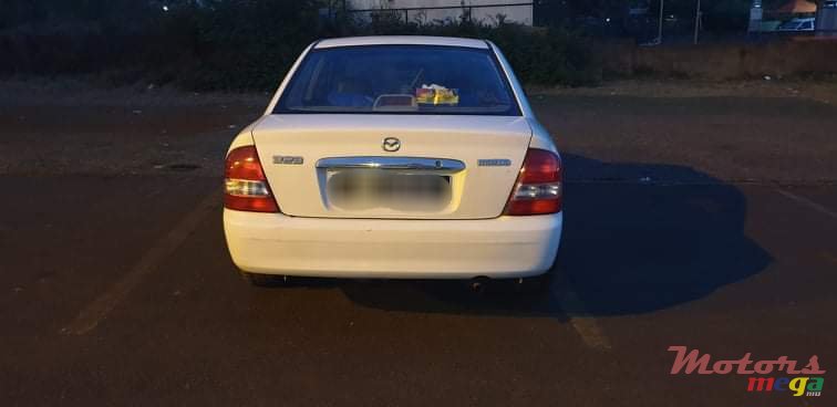 2002' Mazda 323 1324 cc photo #4