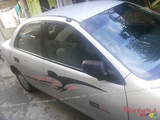 1997' Mazda 323 photo #1