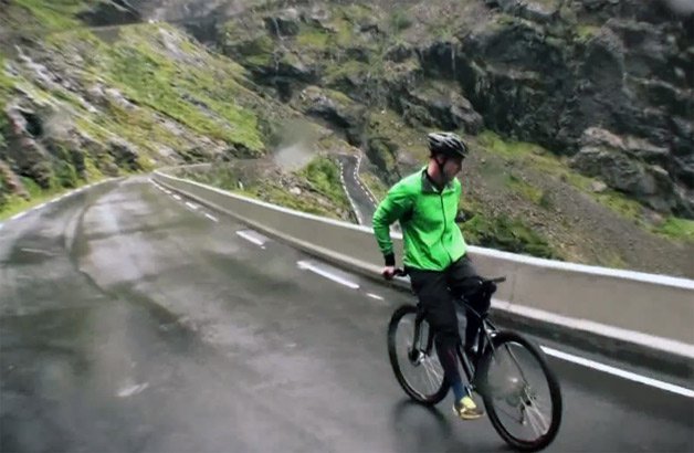 Insane Cyclist Rides Down Wet Mountain Road at 80 km/h... Backward