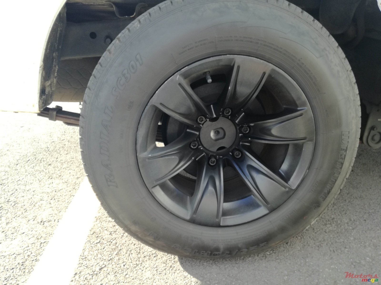 2008' Nissan Hardbody 15" rims -ve offset photo #2